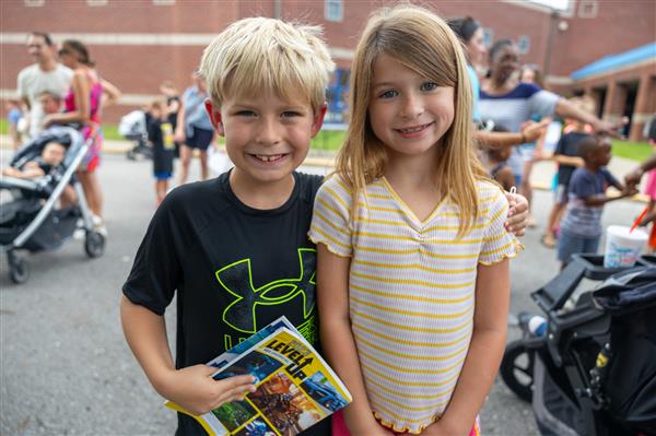 two students smiling
